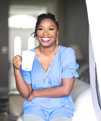 Ebony Johnson, therapist, portrait shot holding a mug